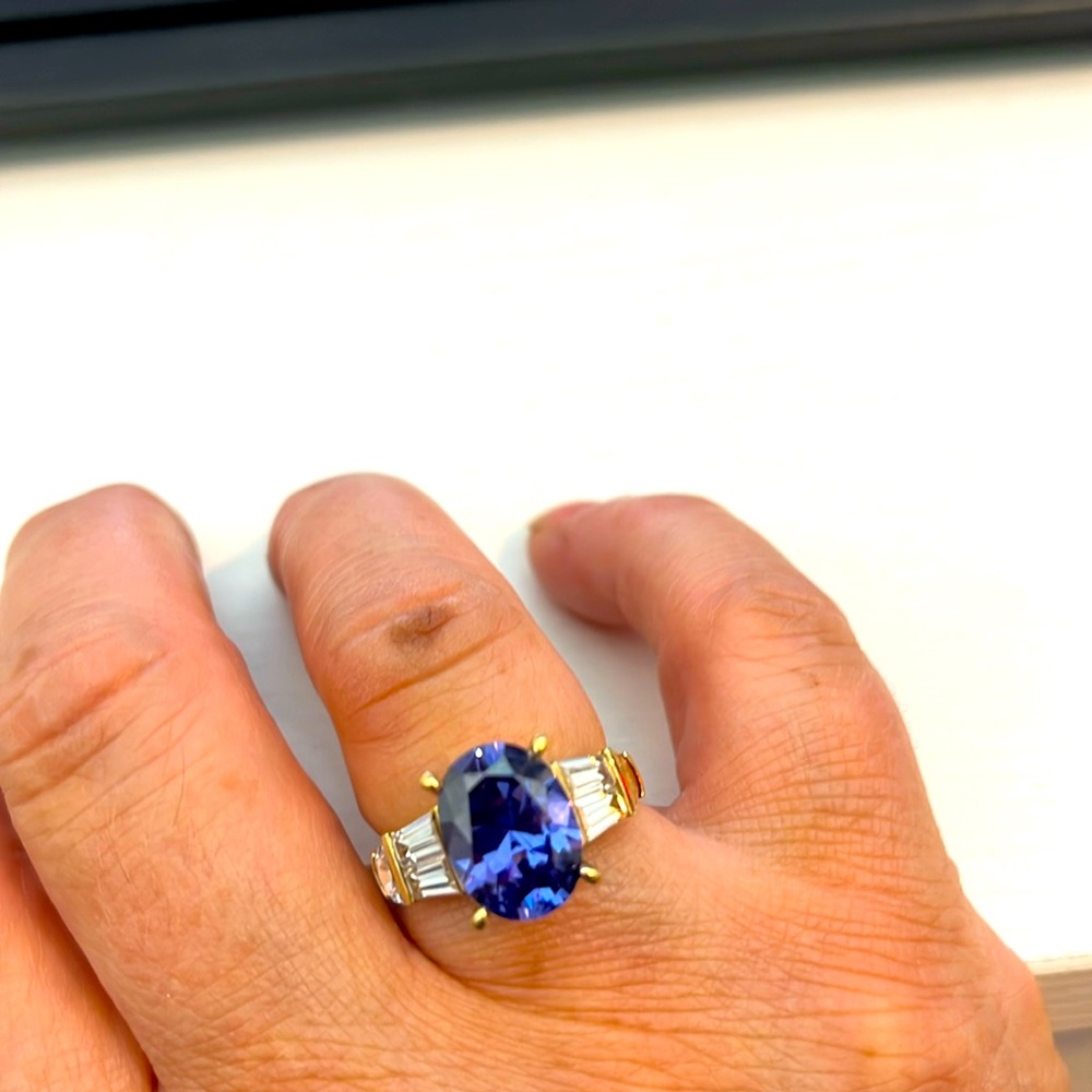 Tanzanite gold plated over sterling silver. Made in China